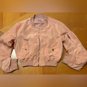 Fashion Nova cropped pink jacket.